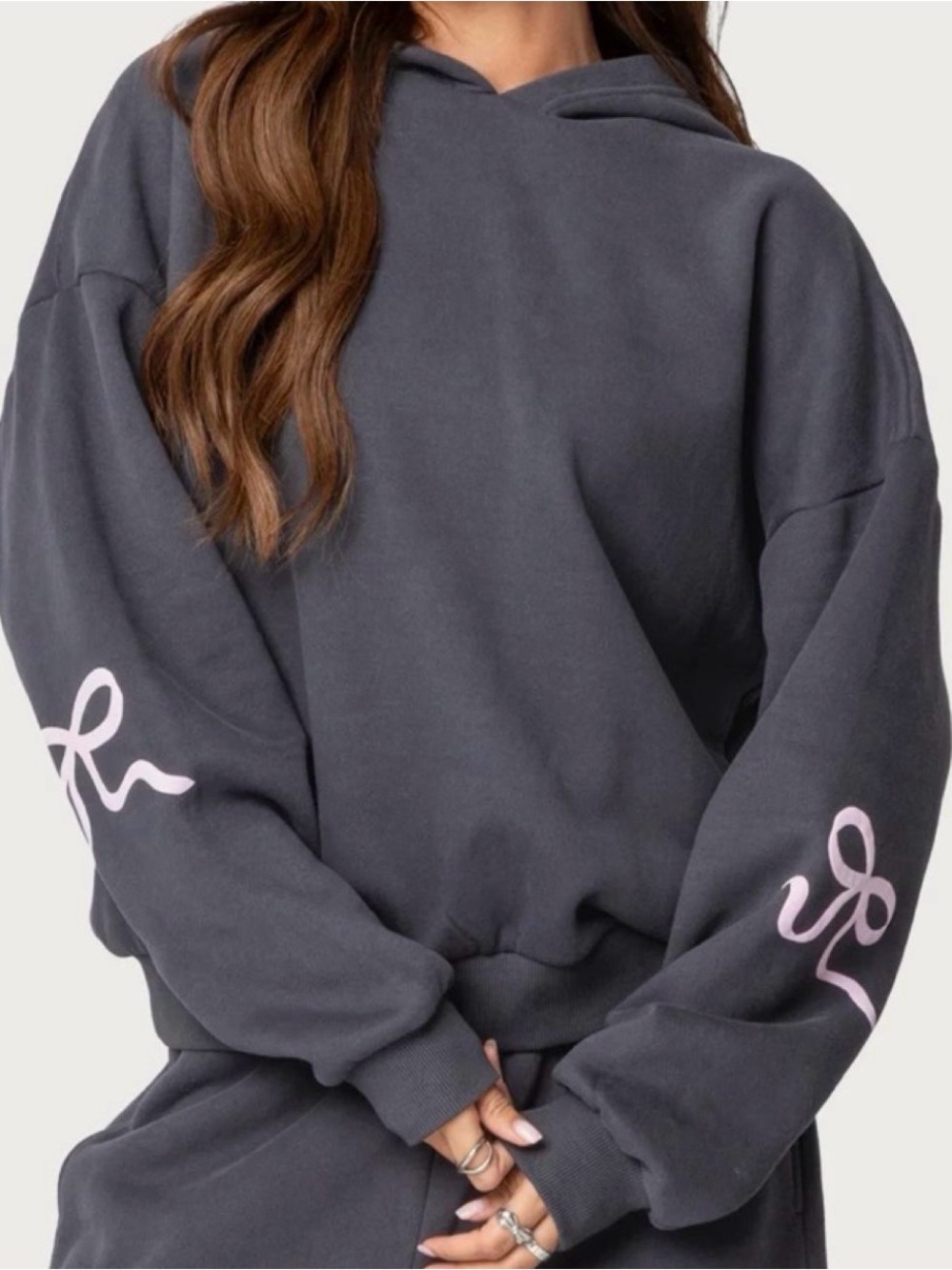 Edikted grey hoodie with pink bow graphic on sleeves
Size: xs - Picture 2 of 2